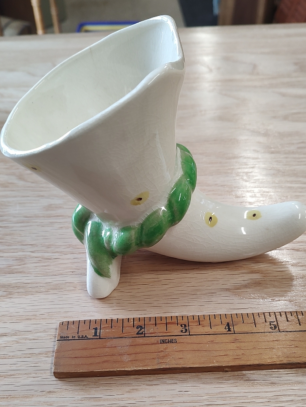 White Ceramic Cornucopia Vase with Green Accent